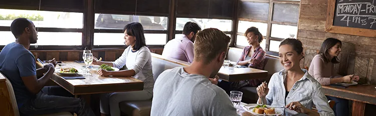 Young couple enjoying lunch in a cafe
